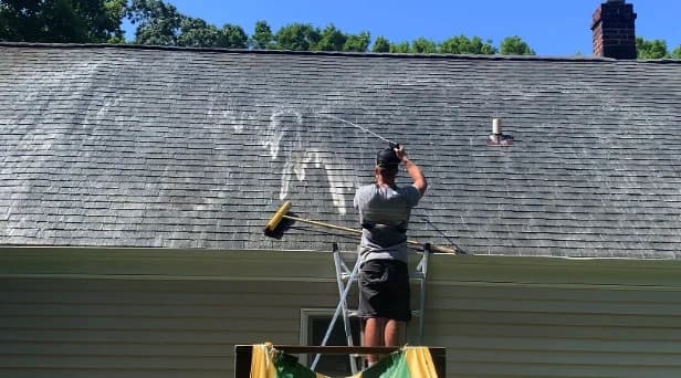 Before and after results of roof washing by Parma Power Washing in Parma