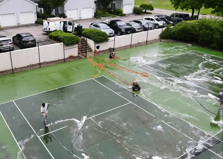 Parma Power Washing professional cleaning outdoor surfaces at Parma property