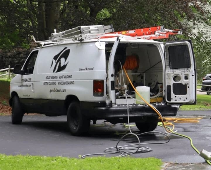 Parma Power Washing professionals cleaning commercial fleet in Parma